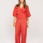 Woman wearing a red linen set
