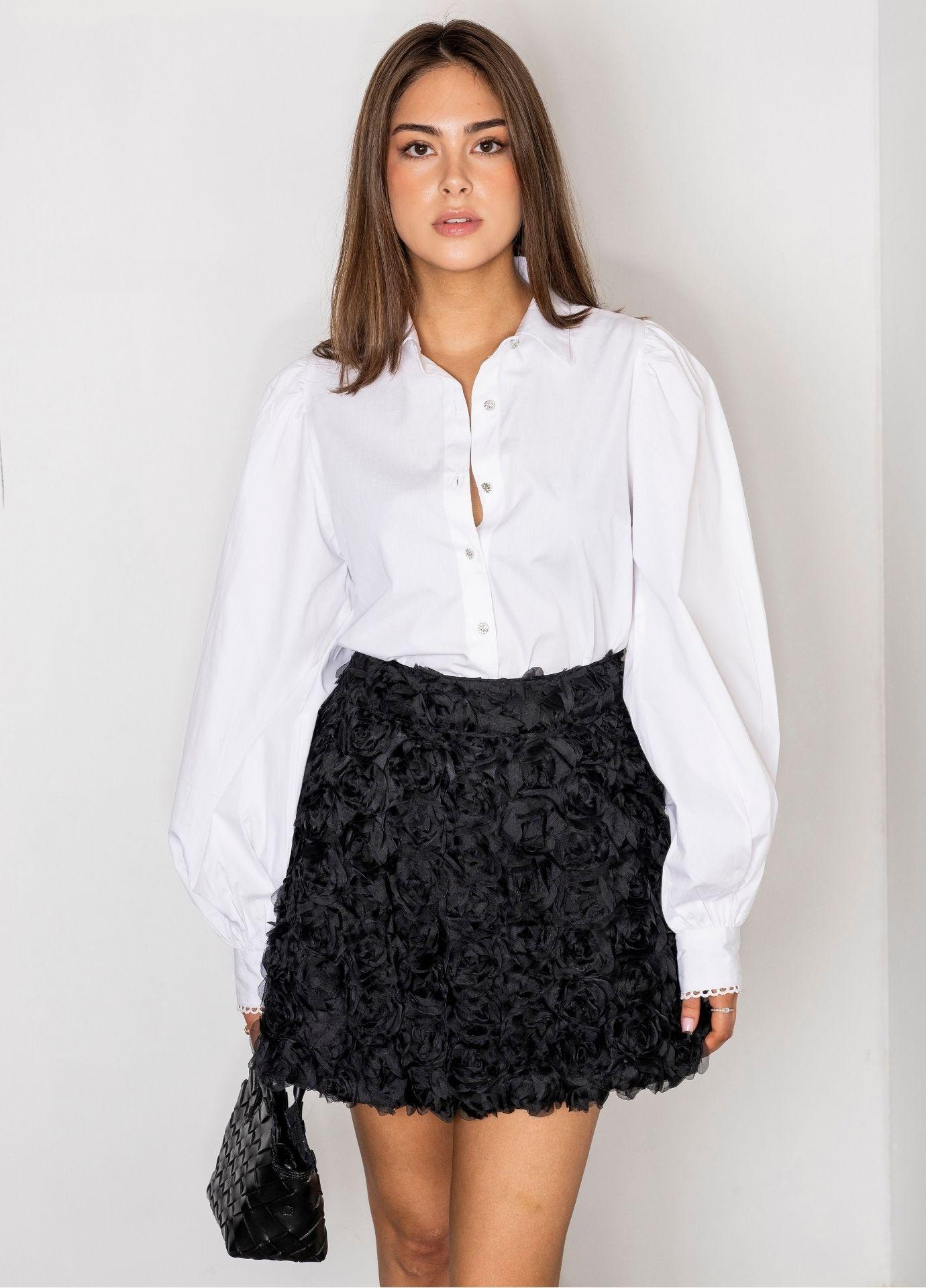 Nina Skirt Rosette in a front view, showing the full rounded shape and the soft rosette texture, worn with a white poplin shirt.